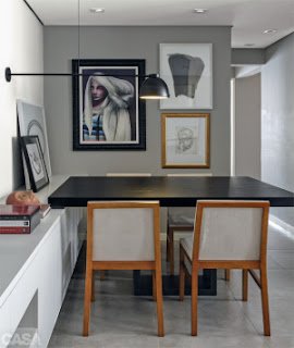 Como fazer uma composição de quadros na parede de sua casa