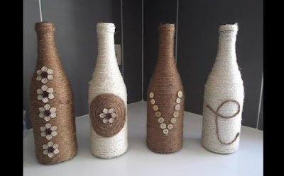 Garrafas decoradas com barbante ou lã