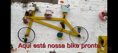 Até com aros velhos de bicicleta dá para criar uma decoração criativa no jardim