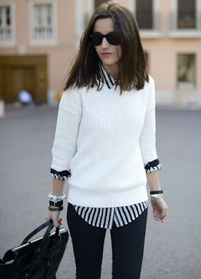 Camisas e blusas de verão:  Suas camisas e blusas de verão não precisam ser aposentadas quando o inverno chegar. Uma maneira incrível de incorporá-las aos seus looks de inverno é usá-las como camadas. Por exemplo, você pode usar uma blusa de alcinha por baixo de um suéter ou cardigã. Deixe a barra da blusa aparecendo e você terá um look moderno e cheio de estilo. Além disso, brincar com as texturas das peças é uma ótima forma de dar um toque interessante ao seu visual.